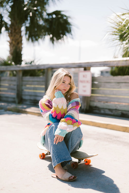 Fun and colorful open front cardigan sweater, drop sleeve style.